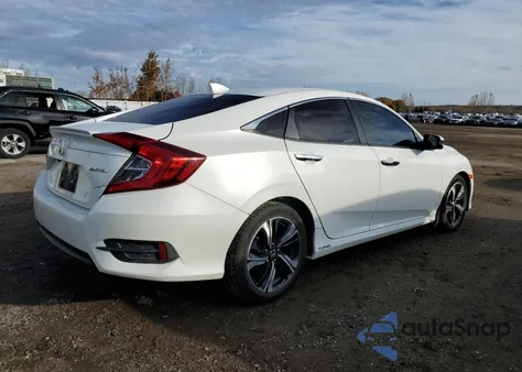 2016 Honda Civic Touring z USA, uszkodzony, nr VIN 2HGFC1F97GH111293